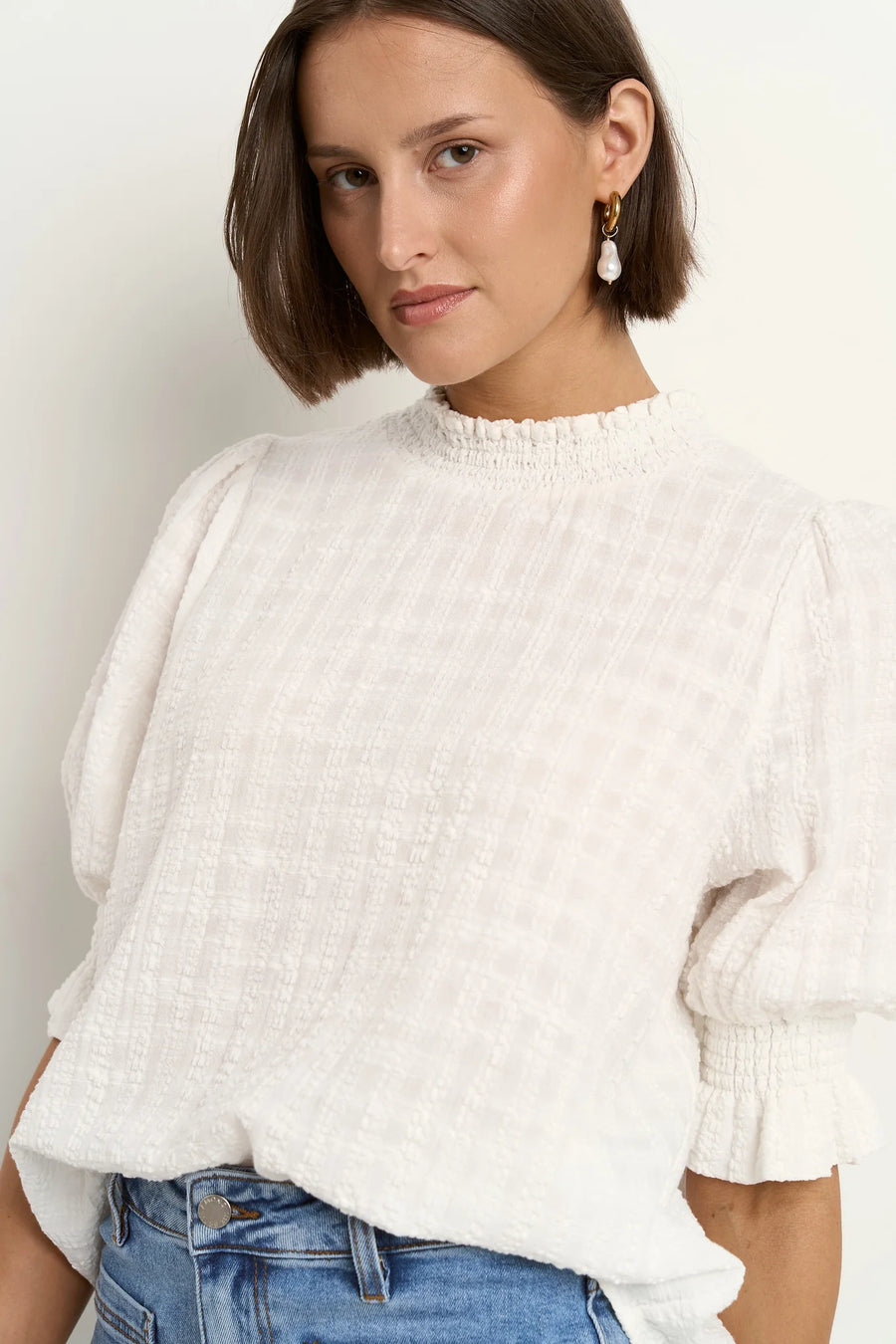 AMONG THE BRAVE INFLUENTIAL IVORY TEXTURE HIGH NECK TOP - WILDROSE