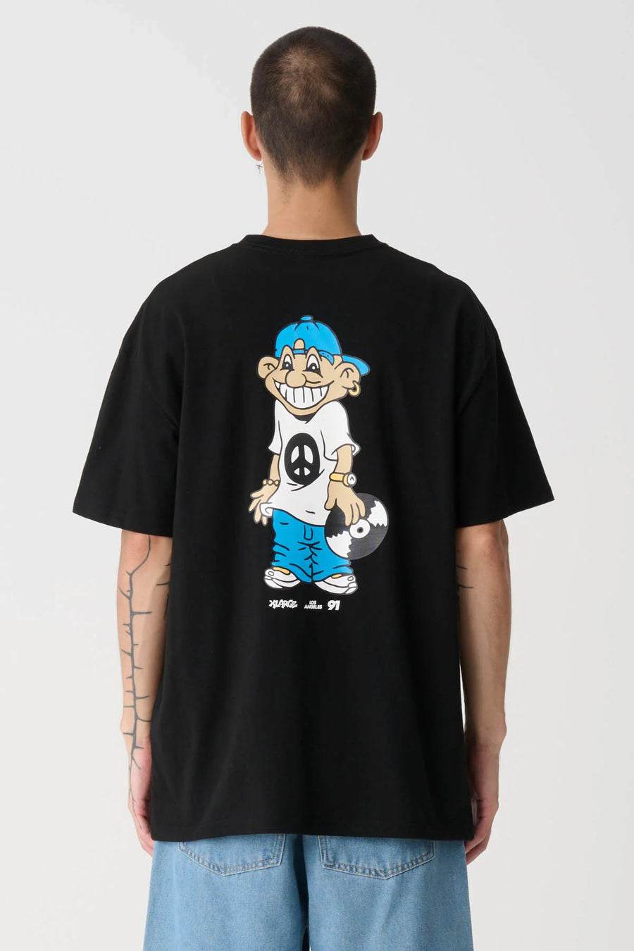 XLARGE PEACE MAN SS TEE - BLACK - WILDROSE